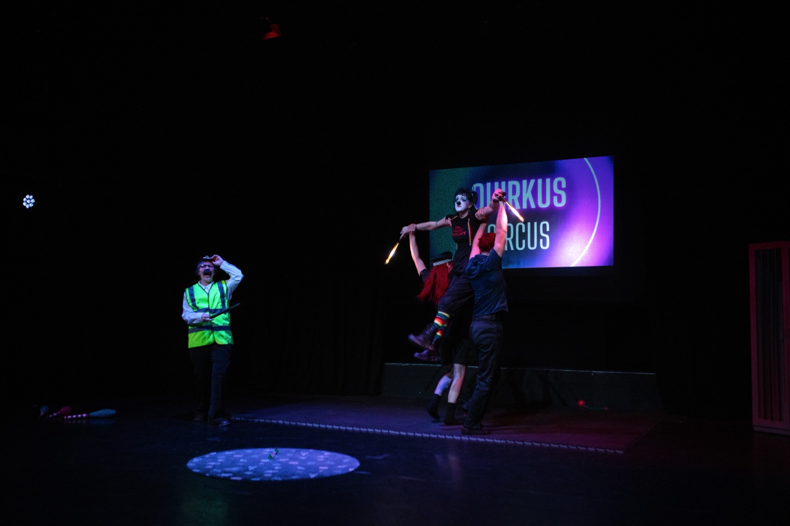 Ensemble circus performance on stage
